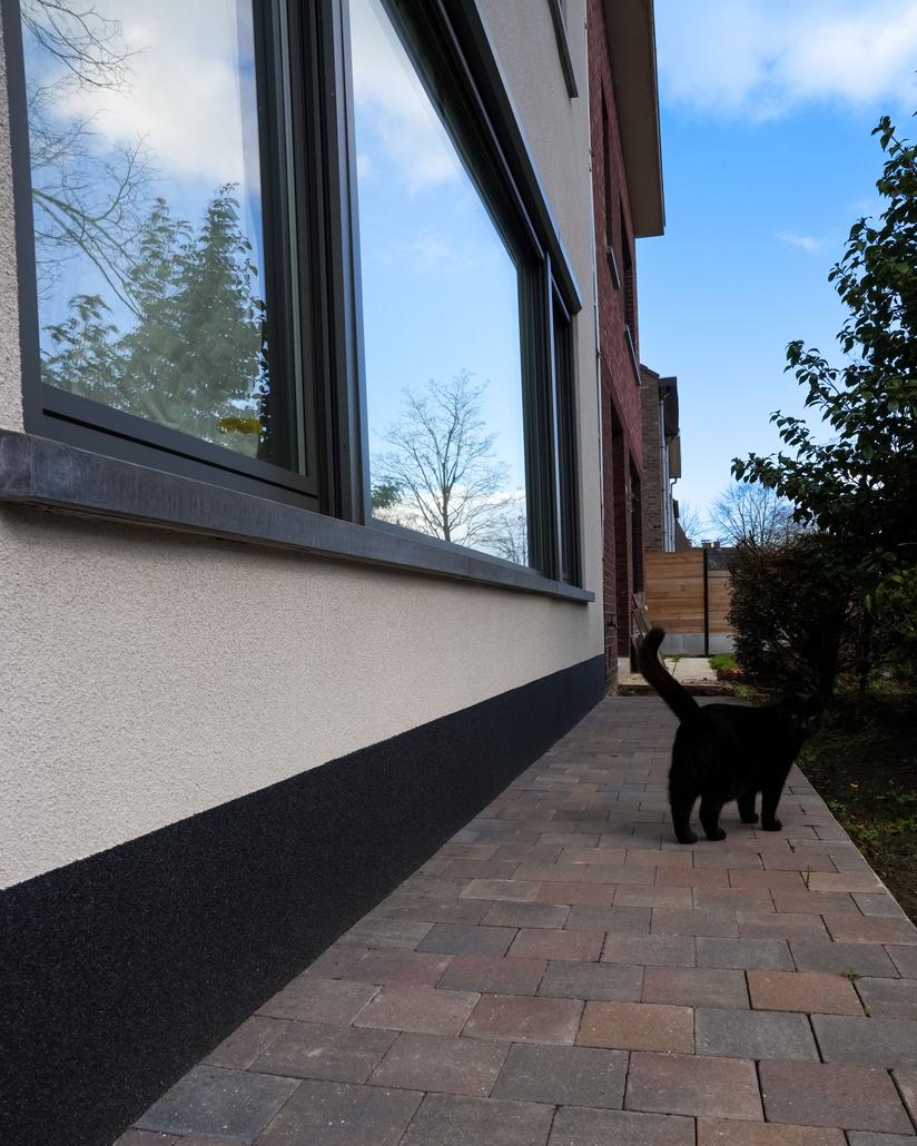 Gevelrenovatie met spuitkurk in Sint-Gillis