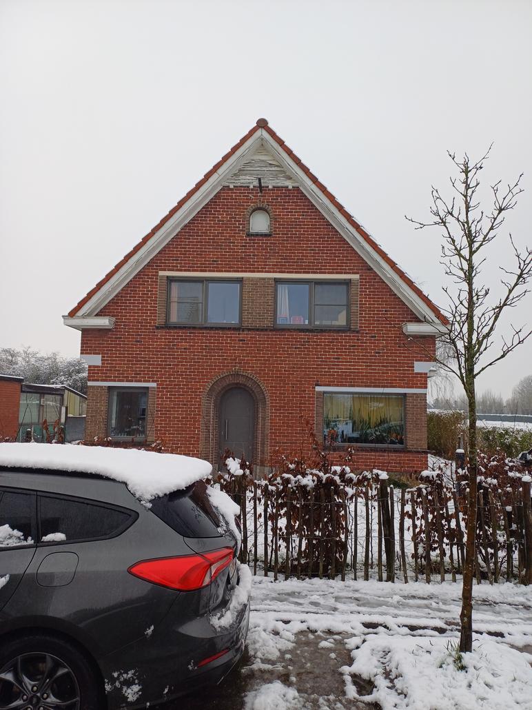 Crepi en hout gevelisolatie in Oostakker