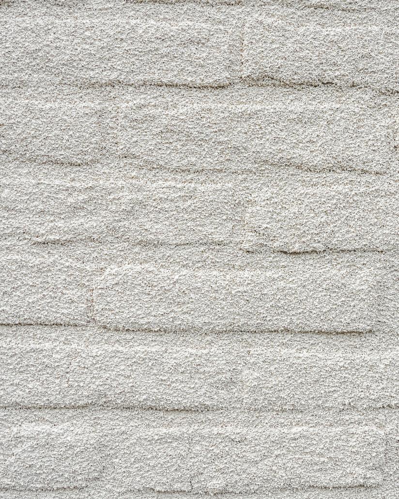 Gevelrenovatie met spuitkurk in Eeklo