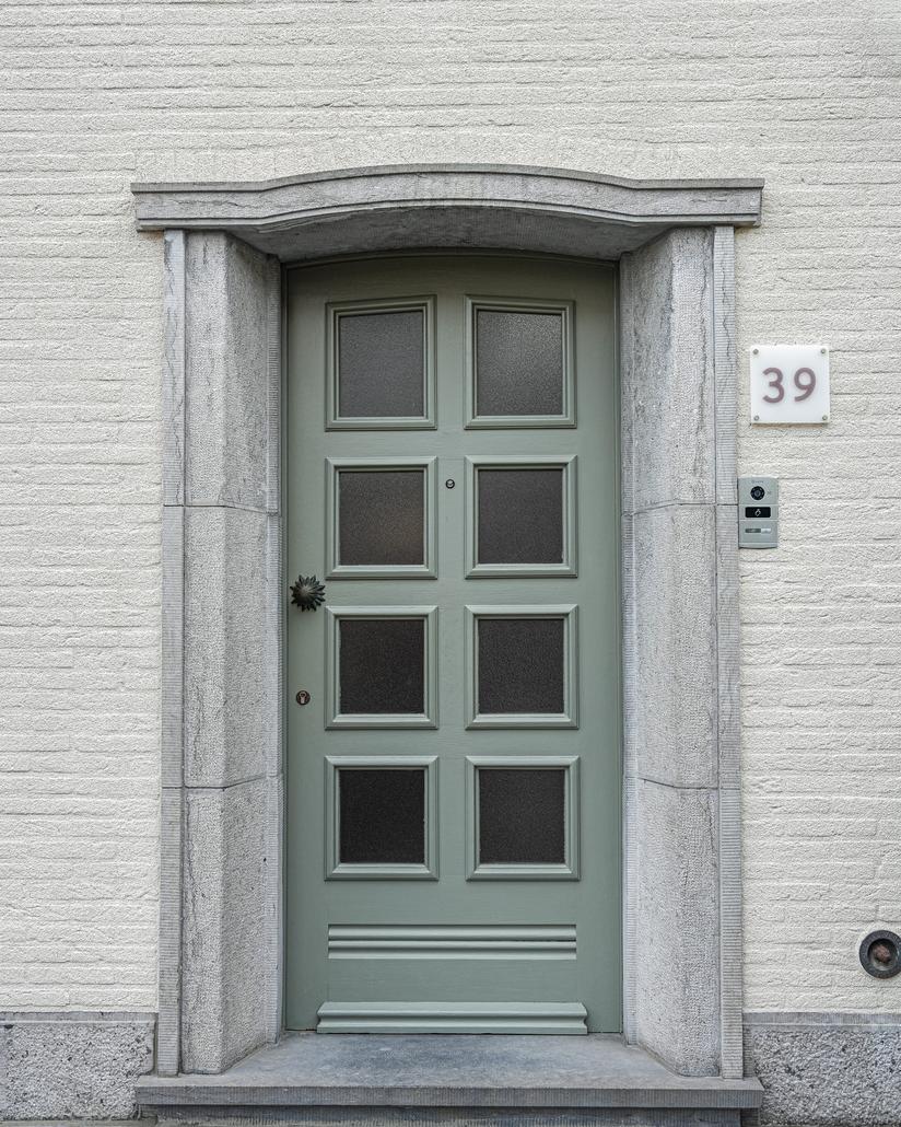 Gevelrenovatie met spuitkurk in Eeklo