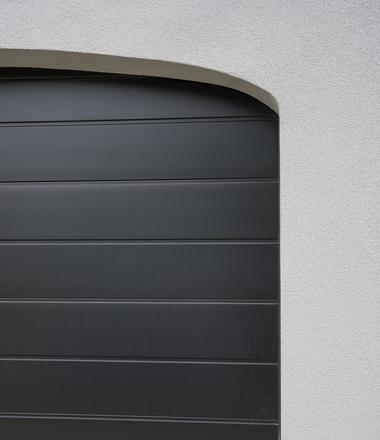 Foto Crepi-gevel in Evergem met isolatie, blauwe steen en alu details